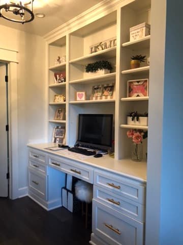 Built-in home office desk and shelving with crown molding in a Kansas City remodel